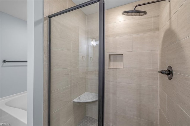 bathroom with an enclosed shower