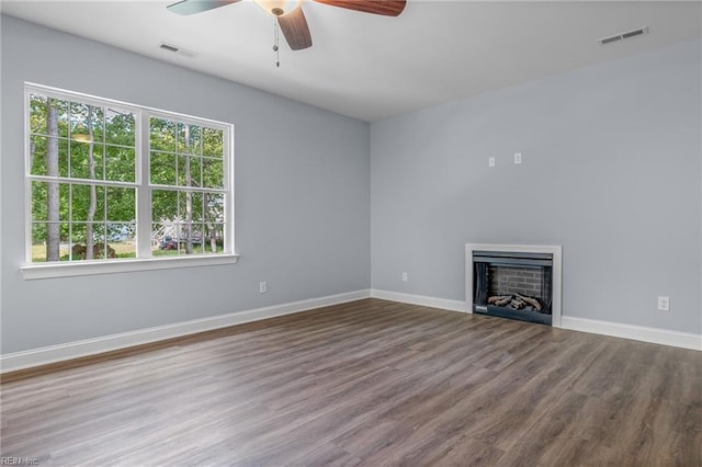 unfurnished room featuring wood-type flooring and ceiling fan