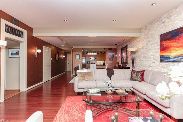 living room with dark hardwood / wood-style flooring