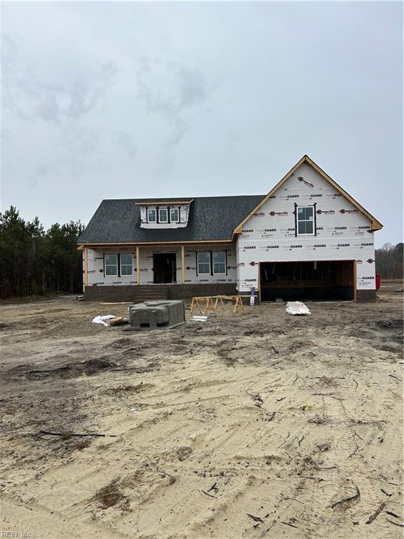 property in mid-construction featuring central air condition unit