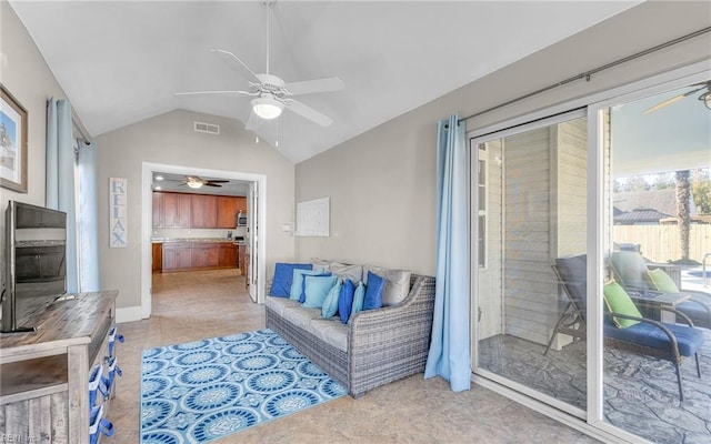 tiled living room with lofted ceiling