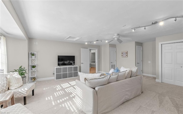 living room featuring light colored carpet and ceiling fan