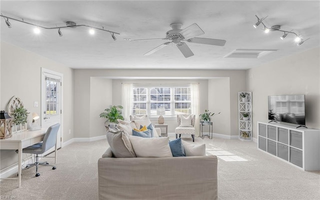 living room featuring ceiling fan and light colored carpet