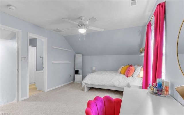 carpeted bedroom featuring lofted ceiling and ceiling fan