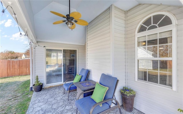 view of patio featuring ceiling fan