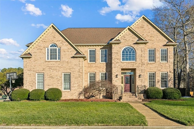 view of front of home with a front yard