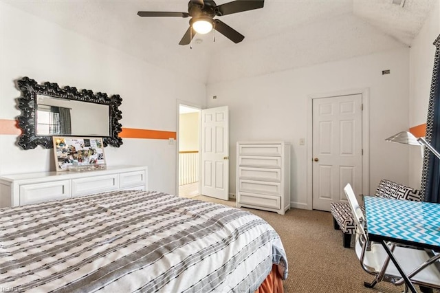 bedroom with vaulted ceiling, light colored carpet, and ceiling fan