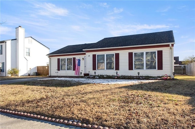 ranch-style house with a front lawn