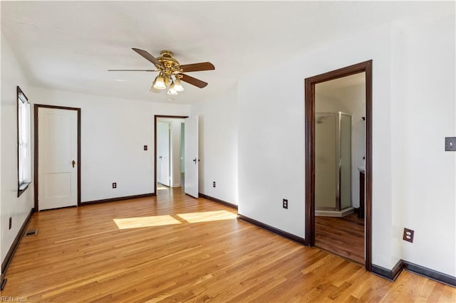 unfurnished bedroom featuring ceiling fan and light hardwood / wood-style flooring