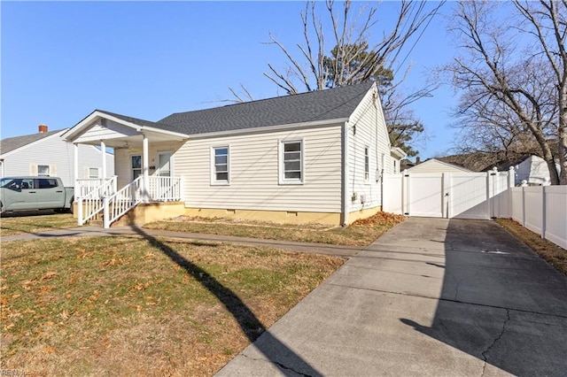 bungalow-style house featuring a front yard