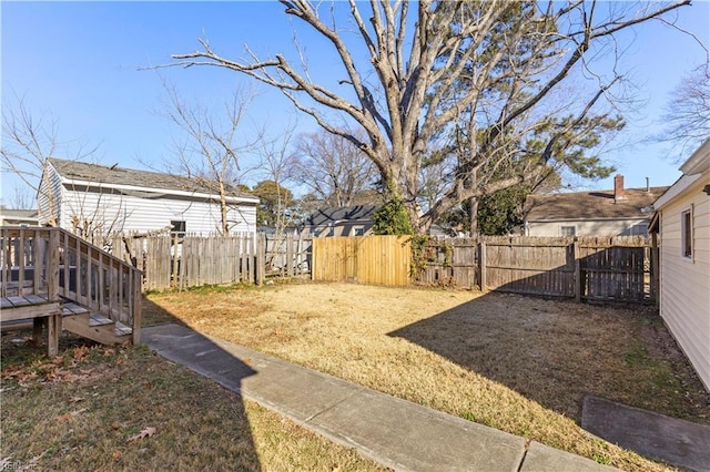 view of yard with a deck