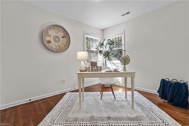 office space with hardwood / wood-style flooring