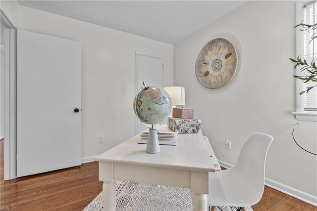 office area featuring dark hardwood / wood-style flooring and a wealth of natural light