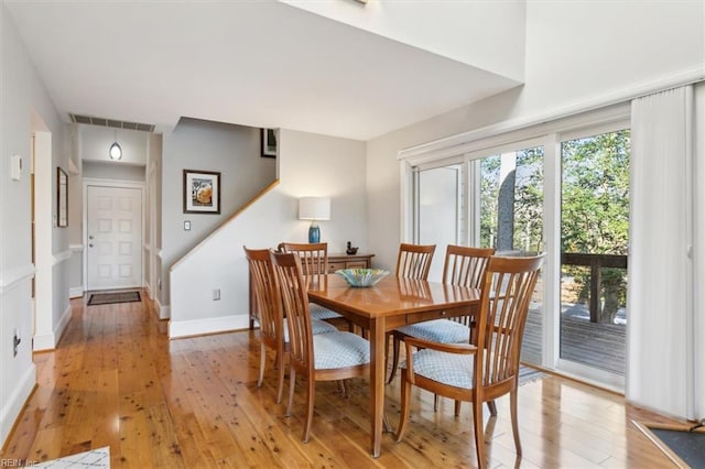 dining area with light wood-type flooring