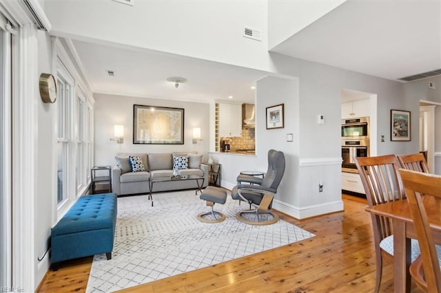 living room with light wood-type flooring