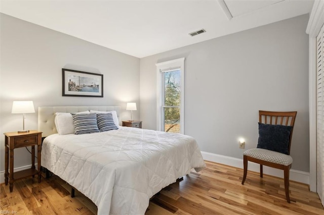 bedroom featuring hardwood / wood-style floors