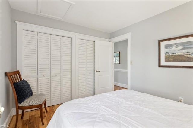 bedroom with light hardwood / wood-style floors