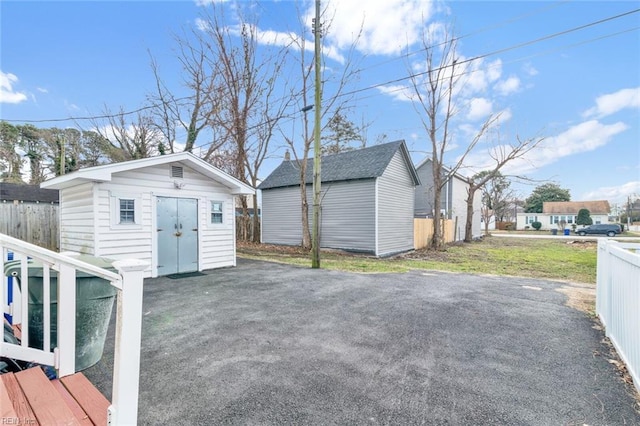 exterior space with a storage shed