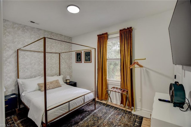 bedroom featuring wood-type flooring