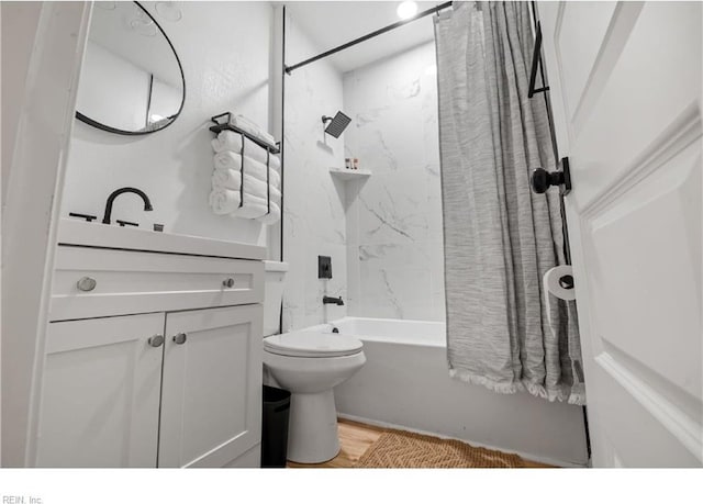 bathroom with toilet, shower / tub combo, and hardwood / wood-style flooring