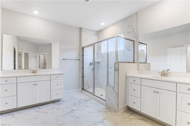 bathroom with an enclosed shower and vanity