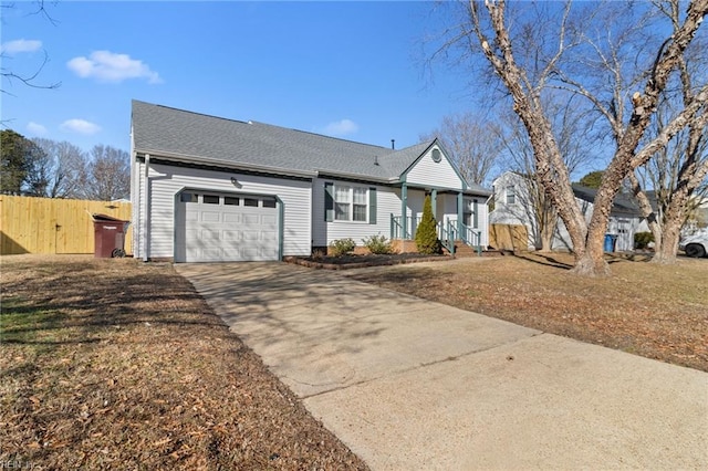 ranch-style house featuring a front lawn and a garage