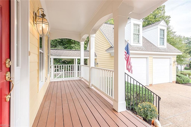 wooden deck featuring covered porch