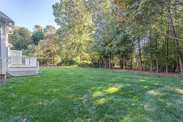 view of yard featuring a deck