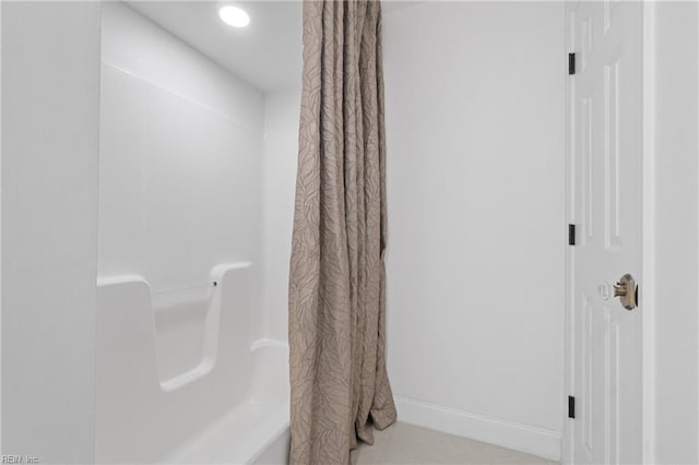 bathroom featuring tile patterned flooring and a shower with curtain