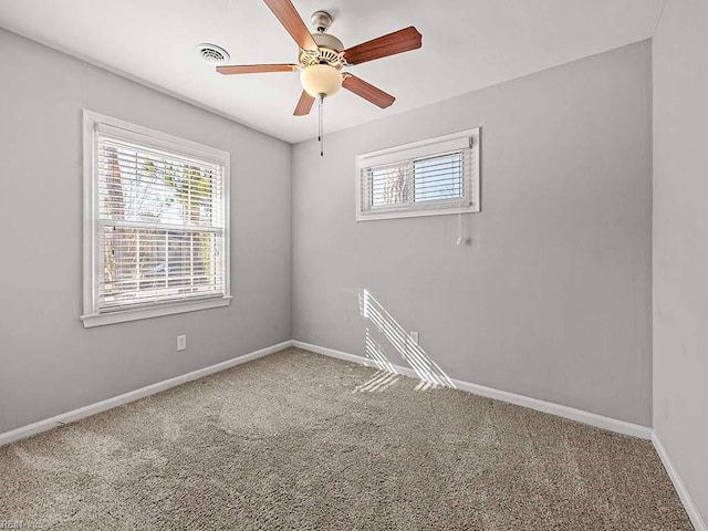 unfurnished room featuring carpet flooring and ceiling fan