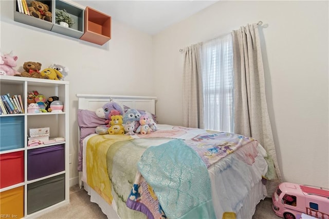 bedroom with light carpet