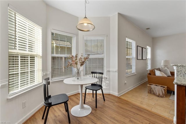 dining room featuring light hardwood / wood-style floors