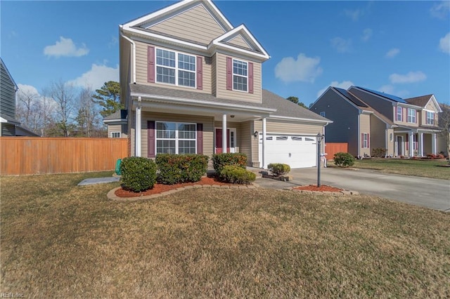 view of front facade featuring a front yard and a garage