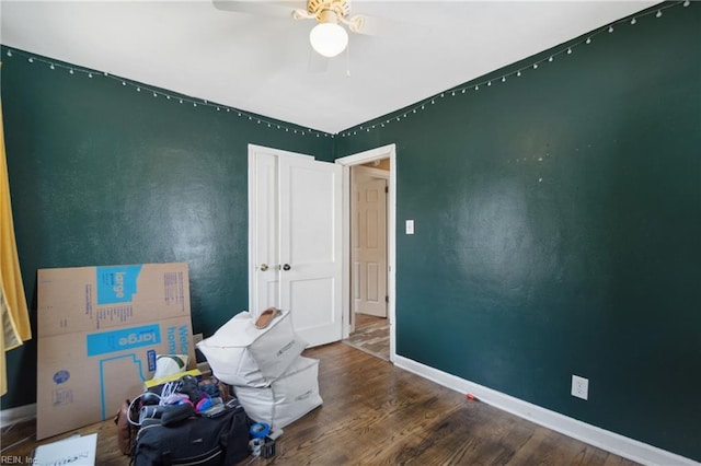 interior space with hardwood / wood-style flooring and ceiling fan