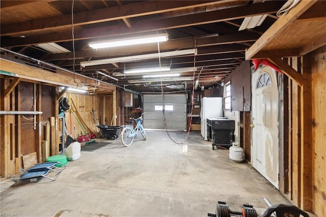 garage with white refrigerator