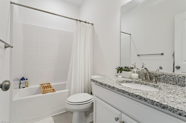 full bathroom with toilet, shower / bath combo with shower curtain, and vanity