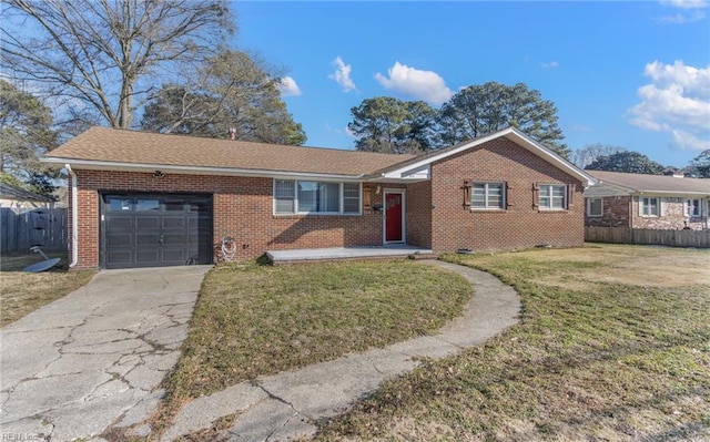 ranch-style house with a front lawn and a garage