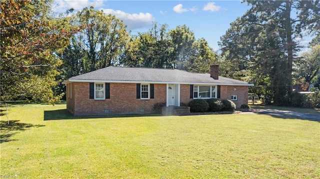 ranch-style home with a front lawn