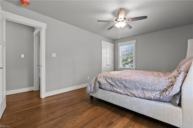 bedroom featuring dark wood-type flooring and ceiling fan