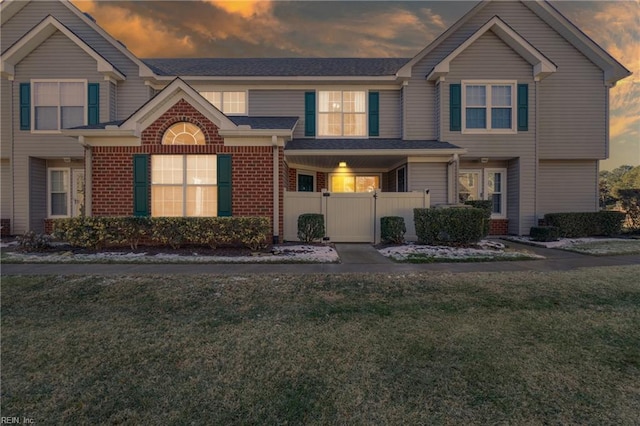 view of property with a lawn