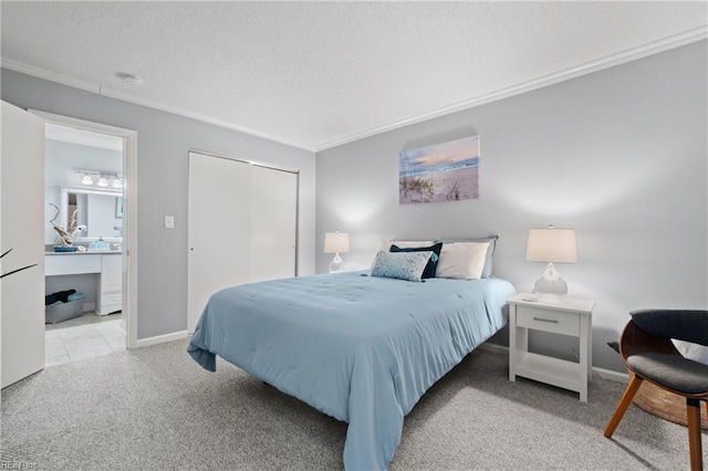 bedroom with a textured ceiling, light carpet, a closet, and crown molding