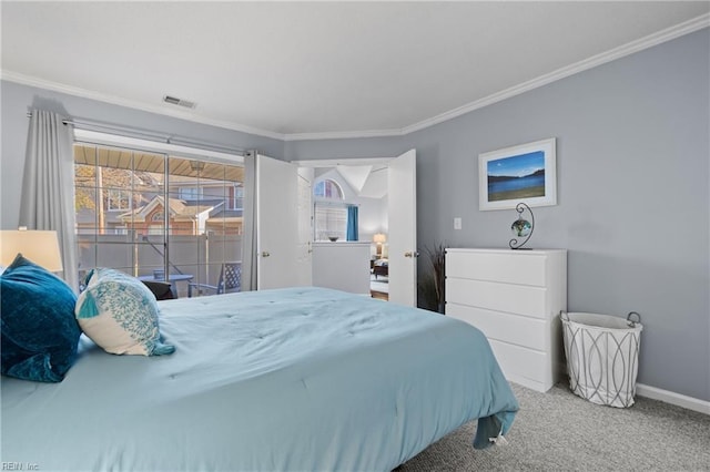 bedroom featuring crown molding and carpet flooring