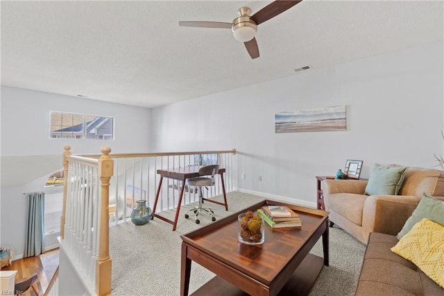 living room with ceiling fan