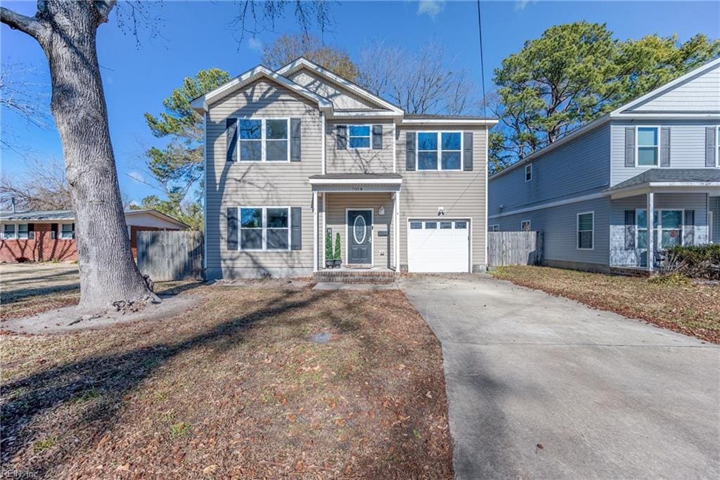 view of front of property with a garage