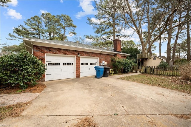 view of side of home with a garage