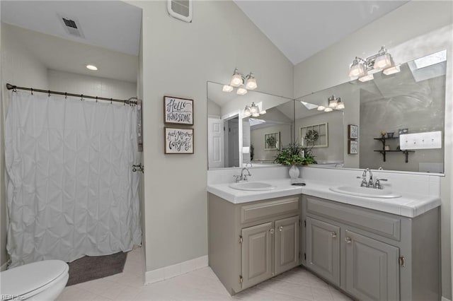 bathroom with toilet, tile patterned flooring, lofted ceiling, a shower with shower curtain, and vanity