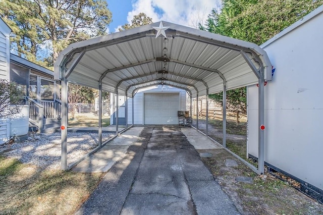 view of vehicle parking featuring a garage and a carport