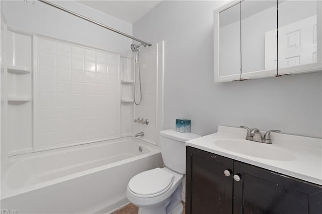 bathroom with vanity, shower / bathing tub combination, and toilet