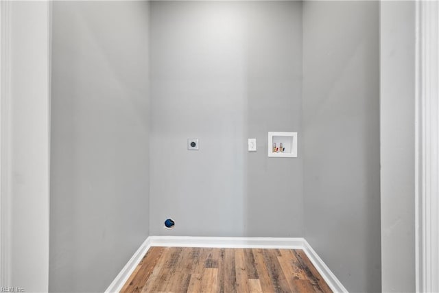 washroom featuring hardwood / wood-style floors, hookup for a washing machine, and hookup for an electric dryer