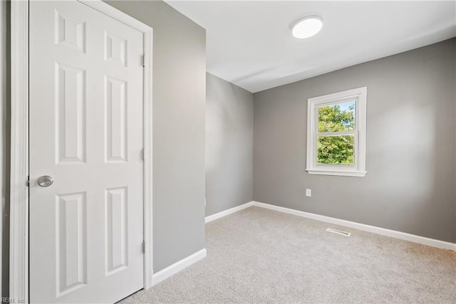 empty room with carpet floors